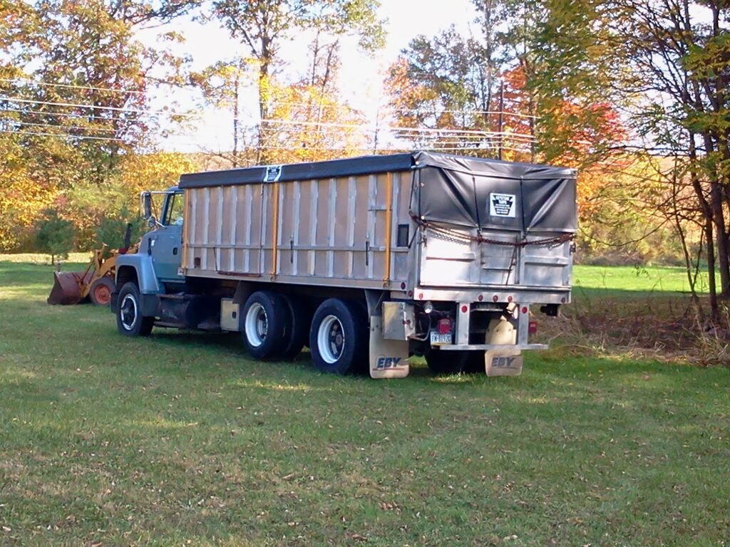 Dump Truck with belted style roll system from Keystone Tarps